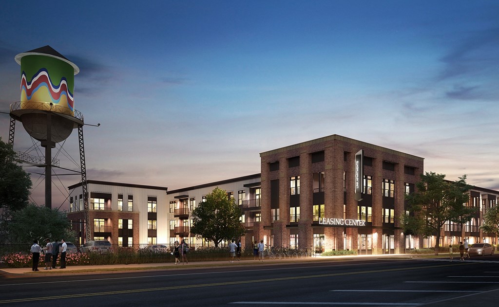 a rendering of a brick building with a water tower