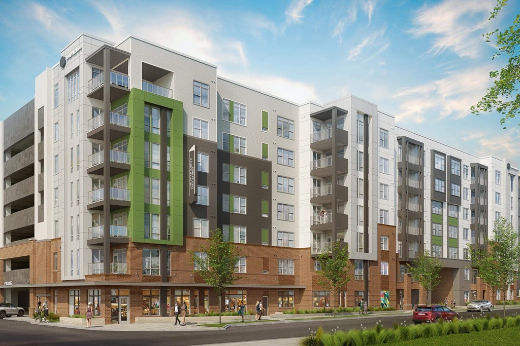a rendering of an apartment building on a city street at Link Apartments® Calyx, North Carolina