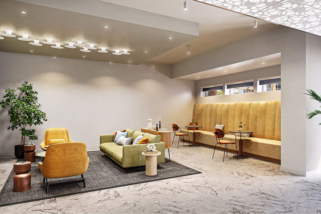 a lobby of a hotel with furniture and a reception desk at Link Apartments® Calyx, Chapel Hill, NC 27517