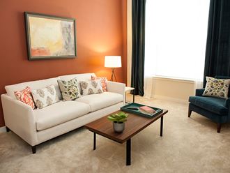 Living Room Sofa at Link Apartments® Manchester, Richmond, VA, 23224
