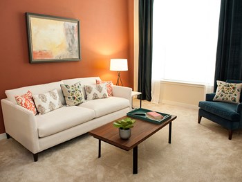 Living Room Sofa Living Room Sofa at Link Apartments® Manchester, Richmond, VA, 23224