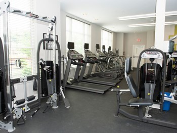Fitness Center With Modern Equipment at Link Apartments® Manchester, Richmond, VA - Photo Gallery 17