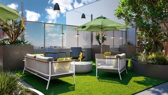 a roof terrace with furniture and an umbrella on a sunny day