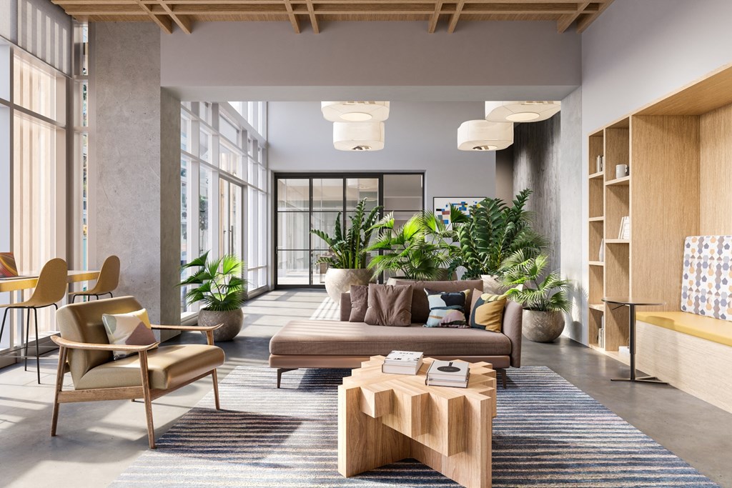 a living room filled with furniture and plants