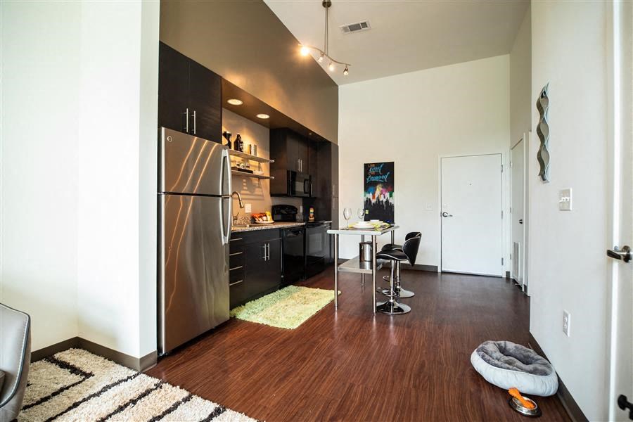 Stainless Steel & Black Appliances In The Kitchen Stainless Steel & Black Appliances In The Kitchen at Link Apartments® Canvas, Atlanta, 30312
