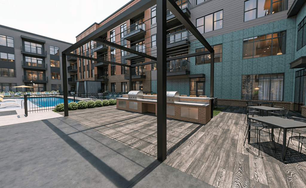 Gas grills at large pool courtyard at Link Apartments® Broad Ave near Kordova in Memphis, TN.