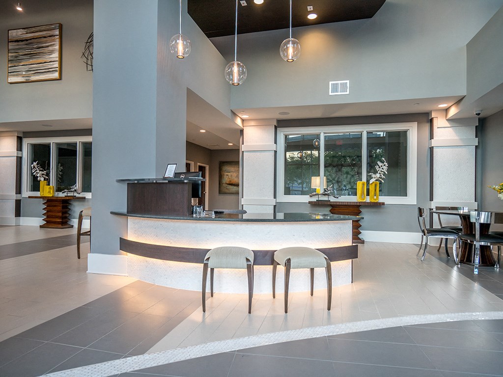 Eat-In Table With High Chairs In Clubhouse at Link Apartments® Glenwood South, Raleigh, NC, 27603