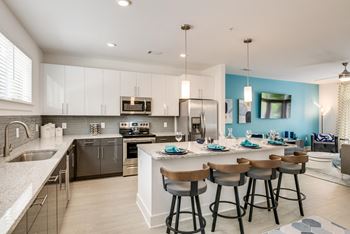 Modern Kitchen with White Cabinet at Link Apartments® Grant Park, Atlanta, GA