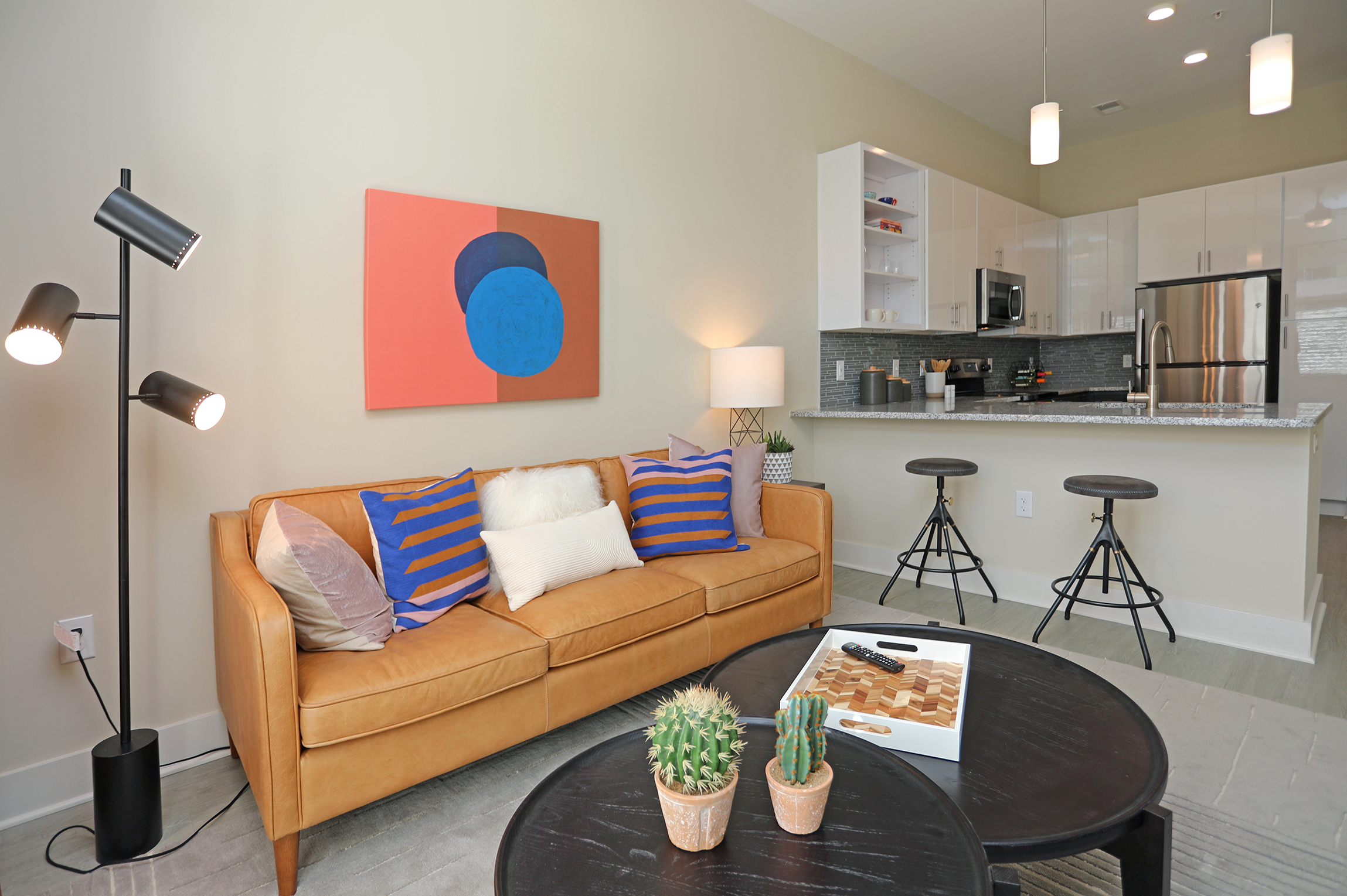 Living Room With Kitchen View at Link Apartments Innovation Quarter, Winston Salem, North Carolina