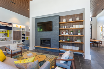 Clubroom With Smart Tv And Ample Of Sitting Area at Link Apartments® Linden, Chapel Hill, North Carolina - Photo Gallery 14