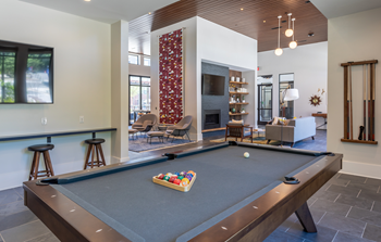 Pool table at Link Apartments® Linden, Chapel Hill, NC - Photo Gallery 16