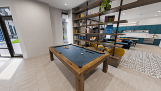 a pool table in the lobby of a building with a kitchen in the background at Link Apartments NoDa 36th, North Carolina, 28206