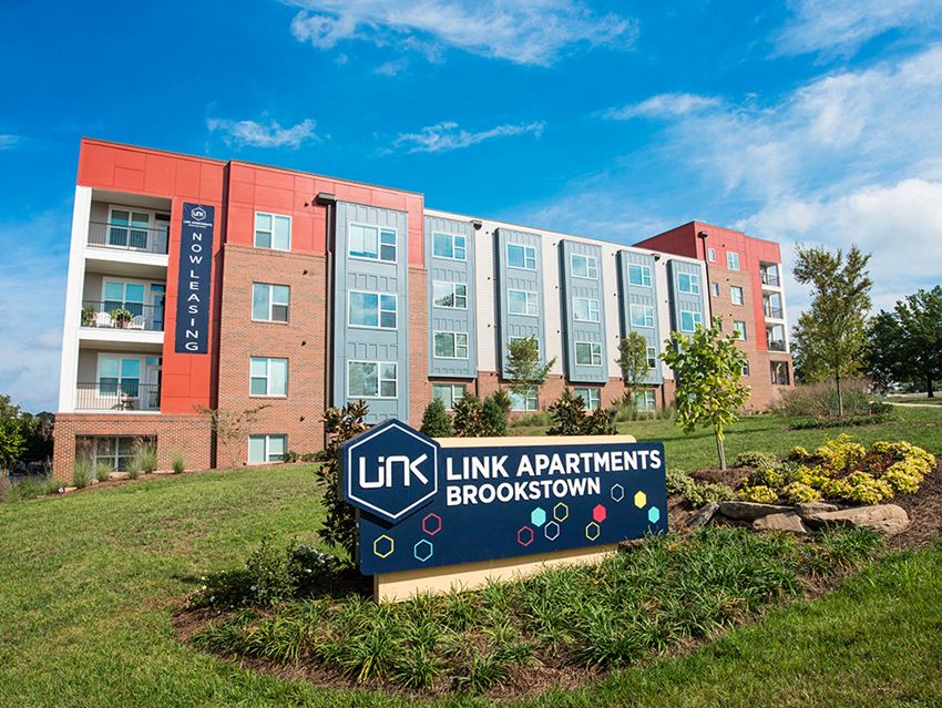 Property Signage at Link Apartments® Brookstown, Winston Salem, NC - Photo Gallery 1