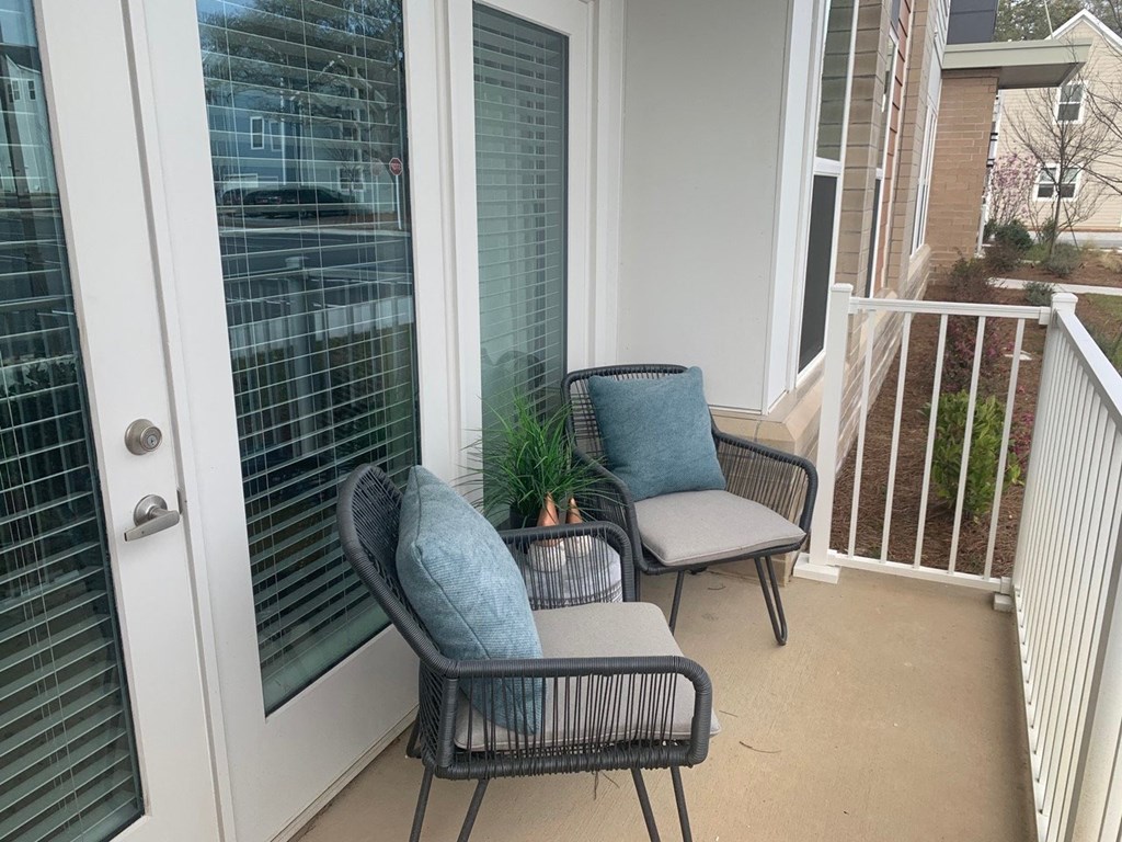 Large over size windows, comfy patio at Link Apartments® Mixson, South Carolina