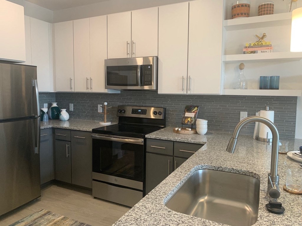 Spacious new kitchen with granite counter tops at Link Apartments® Mixson, North Charleston, SC, 29405