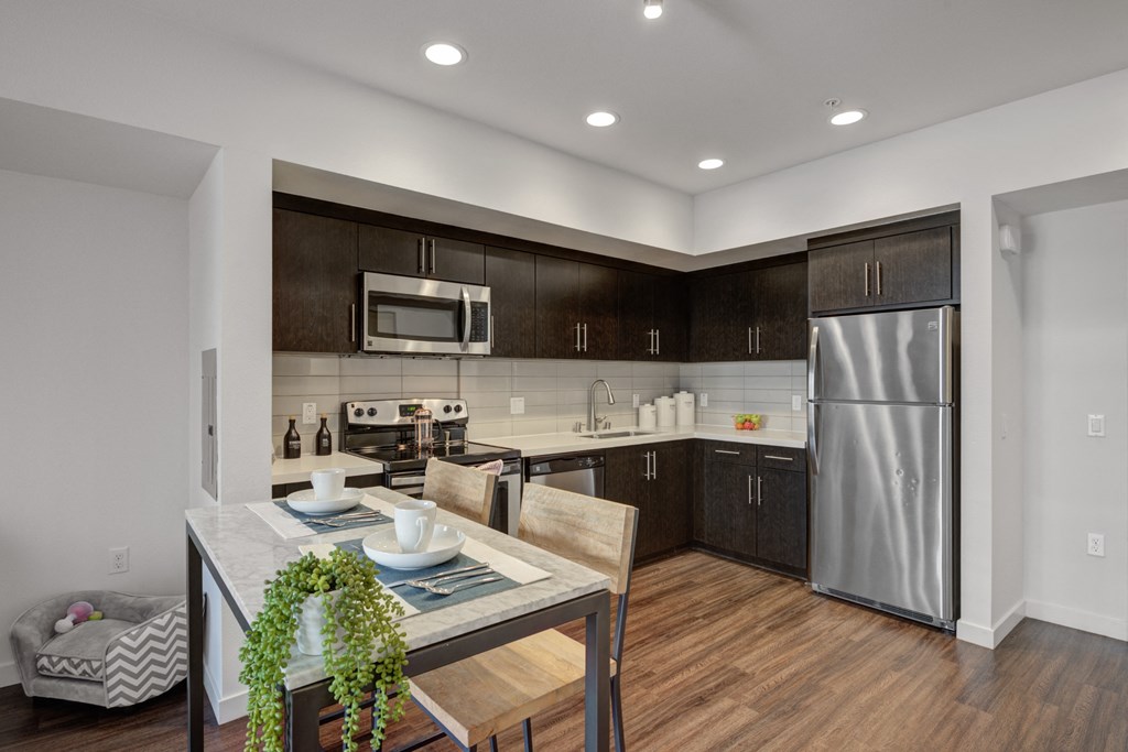 Kitchen with stainless steel appliances at 5550 Hollywood, Los Angeles, 90028