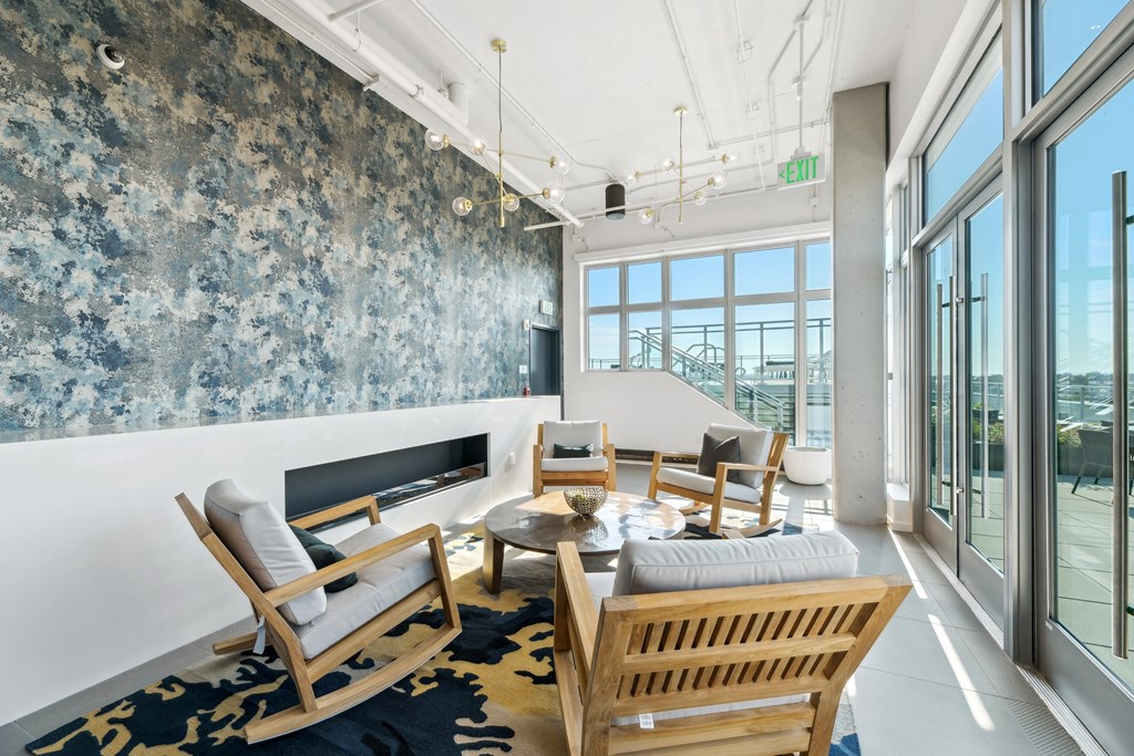 a view of a spiral staircase in a building with rows of wooden benches  at Link Apartments® H Street, Washington, Washington