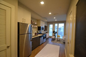 Kitchen and Living View Kitchen and Living Room Area at The George & The Leonard, Atlanta, GA - Photo Gallery 5