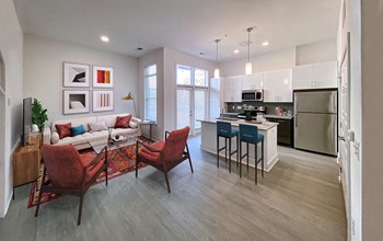 Living Room With Gourmet Kitchen View at Link Apartments® Linden, Chapel Hill, NC, 27517 - Photo Gallery 12