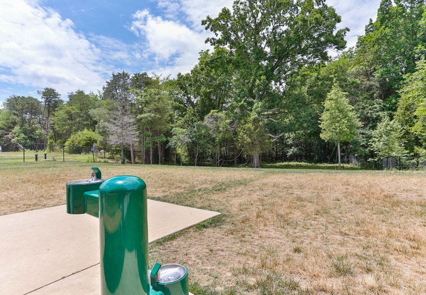 Exteriors Fenced in Dog Park at LangTree Lake Norman Apartments, Mooresville, North Carolina