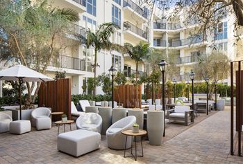 Patio area with white furniture at 5550 Hollywood, California