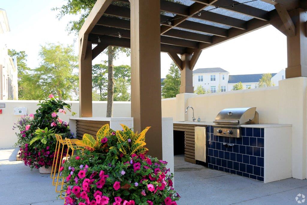 Poolside kitchen with grills at Link Apartments® Mixson, North Charleston, SC
