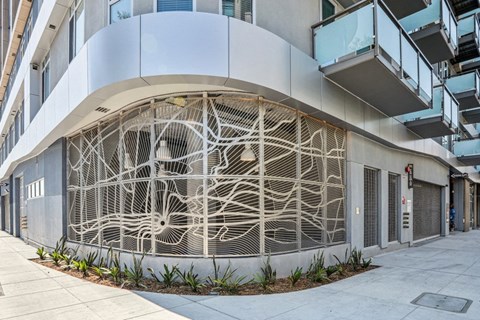 a building with a large mural on the side of it at Link Apartments® Four 12, California, 94607