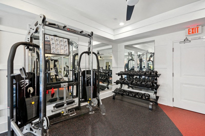 the gym is equipped with weights and cardio equipment at Link Apartments® Brookstown, Winston Salem, 27101