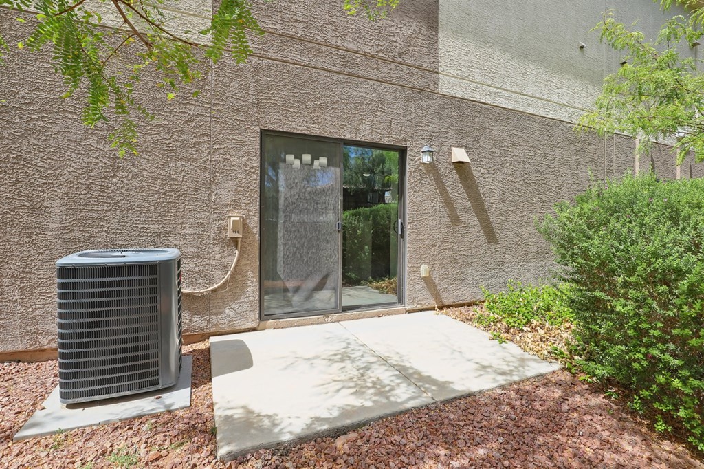 A wall with a window and a door.