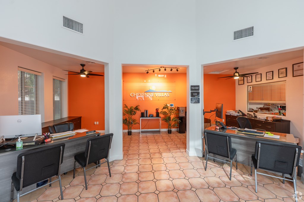 A conference room with a Chevrolet Villas sign on the wall.