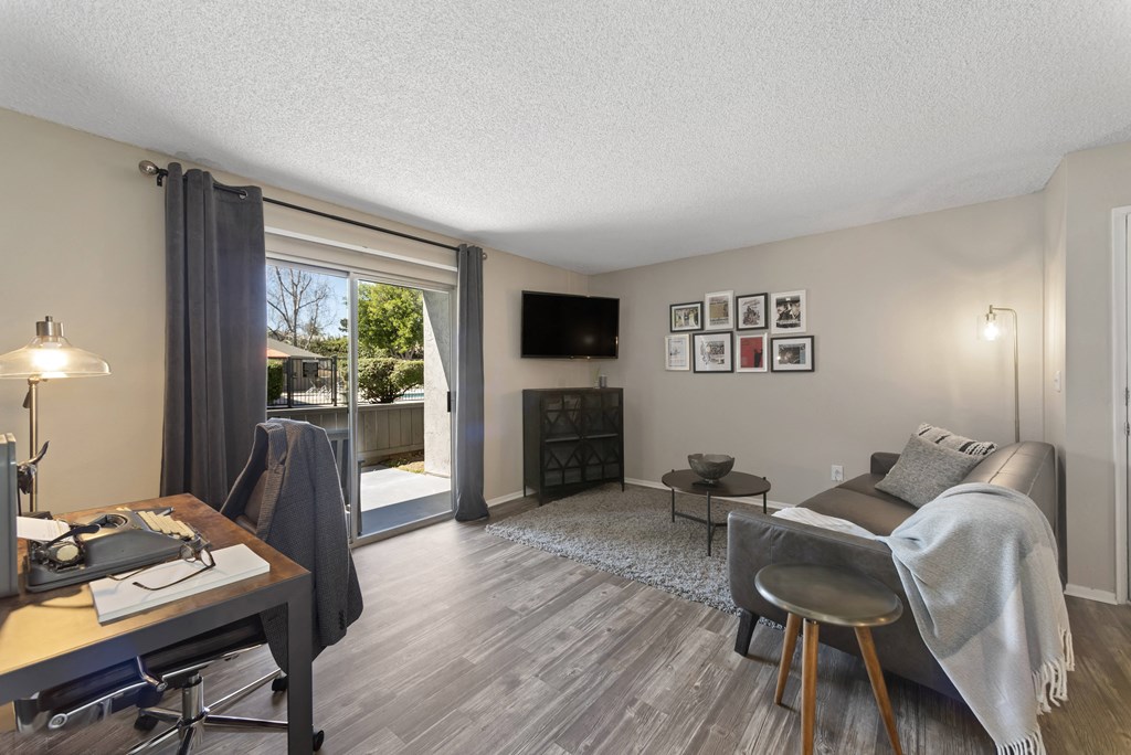 large bright living room with hardwood floors at Morning View Terrace Apartment Homes, Escondido California, 92026
