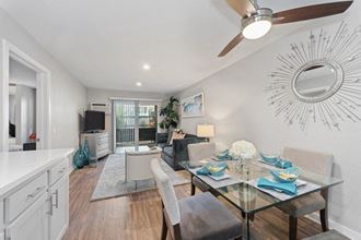 living space with hardwood style floors at Pointe Luxe Apartment Homes, San Diego, CA, 92110
