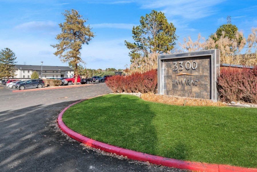 the sign at the entrance to the parking lot of a shopping center