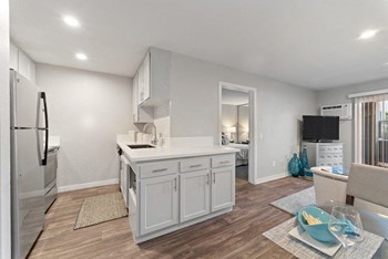 kitchen and dining room at Pointe Luxe Apartment Homes, San Diego, CA, 92110 kitchen and dining room - Photo Gallery 3