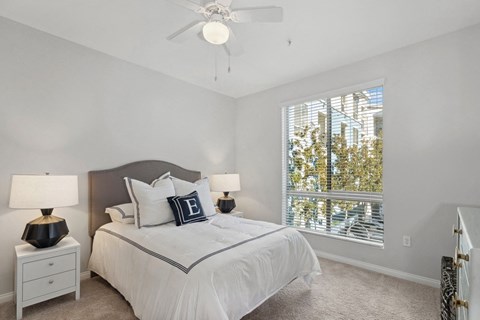 Spacious bedroom with a large window