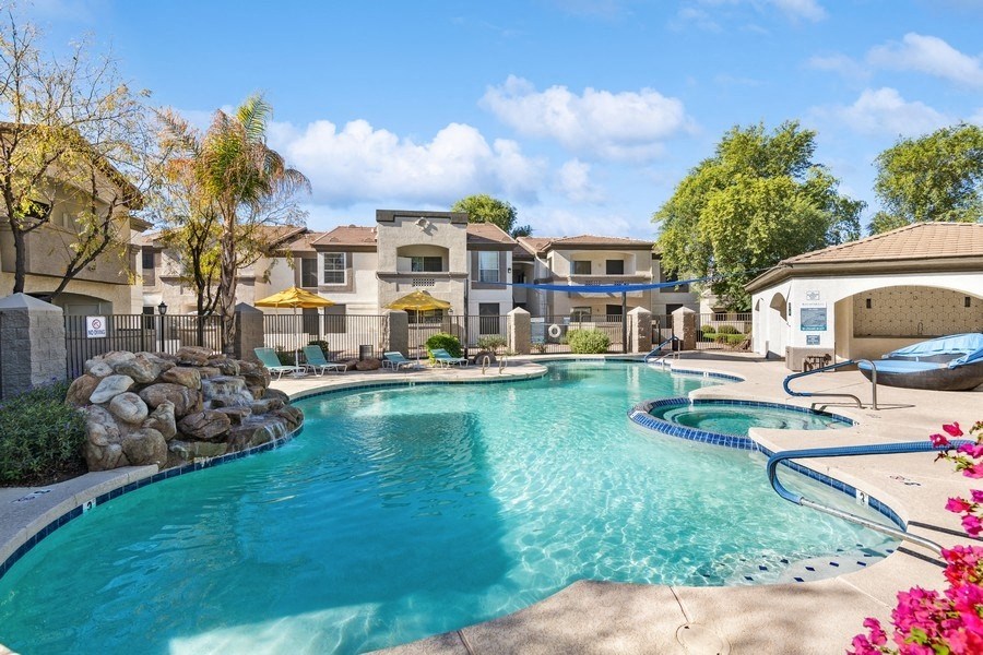a resort style swimming pool at Biscayne Bay Apartments