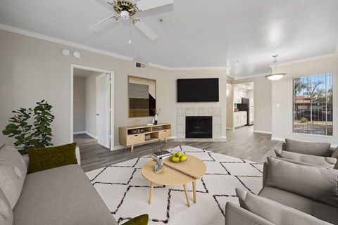 a living room with couches and a table