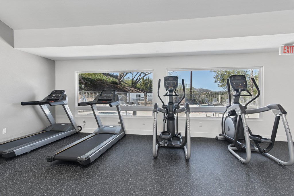 gym with pool view at Morning View Terrace Apartment Homes, California, 92026