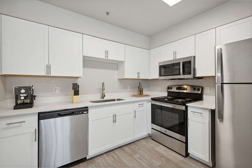White kitchens at Garden Grove Apartments - Photo Gallery 1