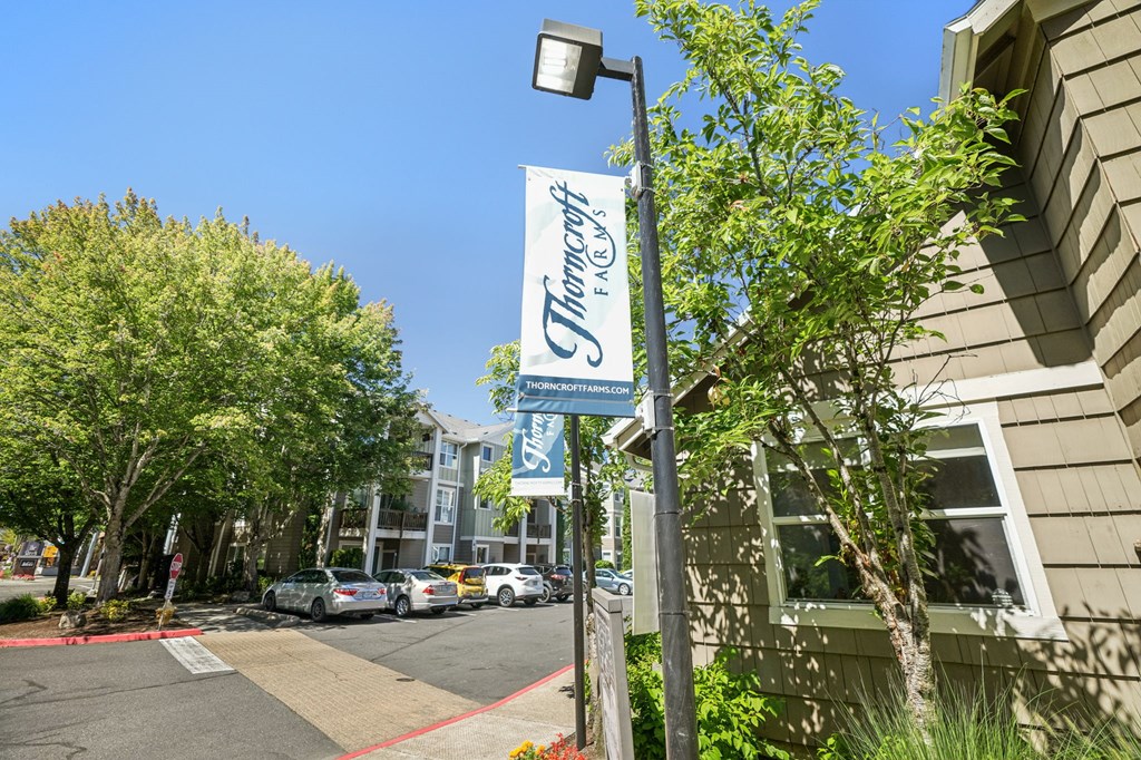 A street view of a building with a sign that says "Trinity's".