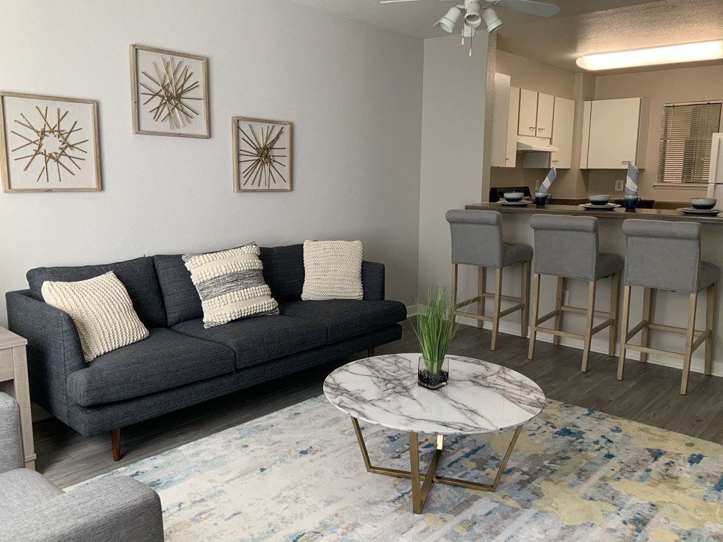 Modern Living Room With Kitchen View at Del Norte Place Apartment Homes, El Cerrito, CA