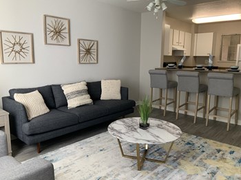 Modern Living Room With Kitchen View Modern Living Room With Kitchen View at Del Norte Place Apartment Homes, El Cerrito, CA - Photo Gallery 3