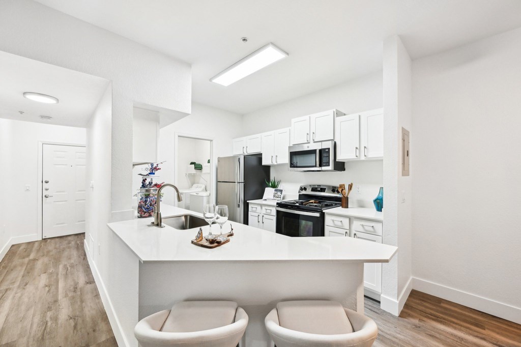 barstools at white kitchen counter