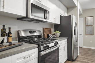 Fully Equipped Kitchen In Clubhouse Fully Equipped Kitchen In Clubhouse at Mitchell Place Apartments, California - Photo Gallery