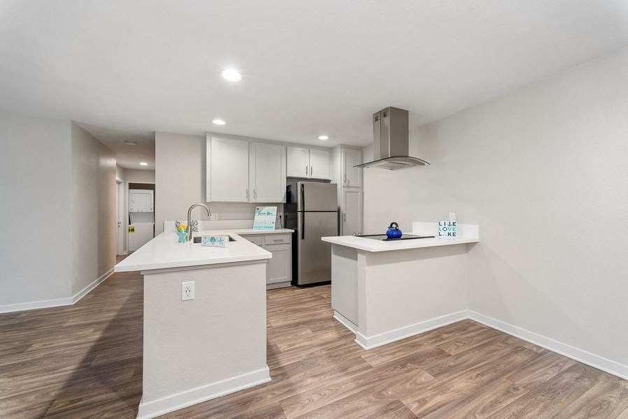 kitchen with island at Pointe Luxe Apartment Homes, San Diego, CA, 92110