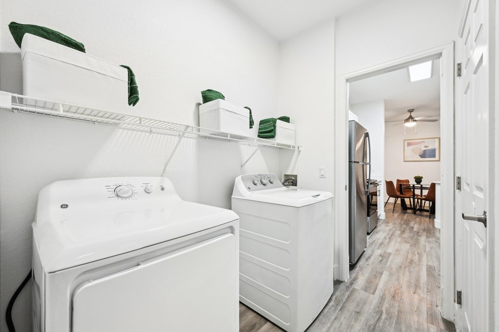 A laundry room with a washer and dryer.