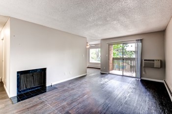Unfurnished Living Room at 3300 Tamarac Apartments - Photo Gallery 3