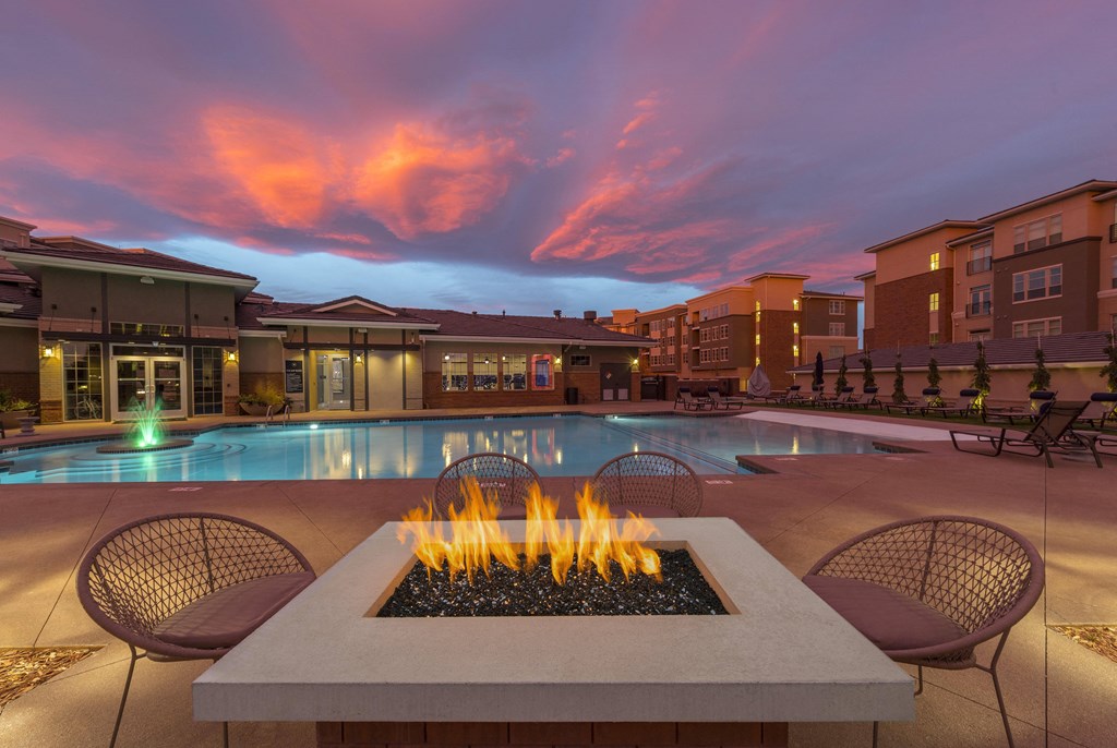 outdoor firepit at dusk at Malbec at Vallagio