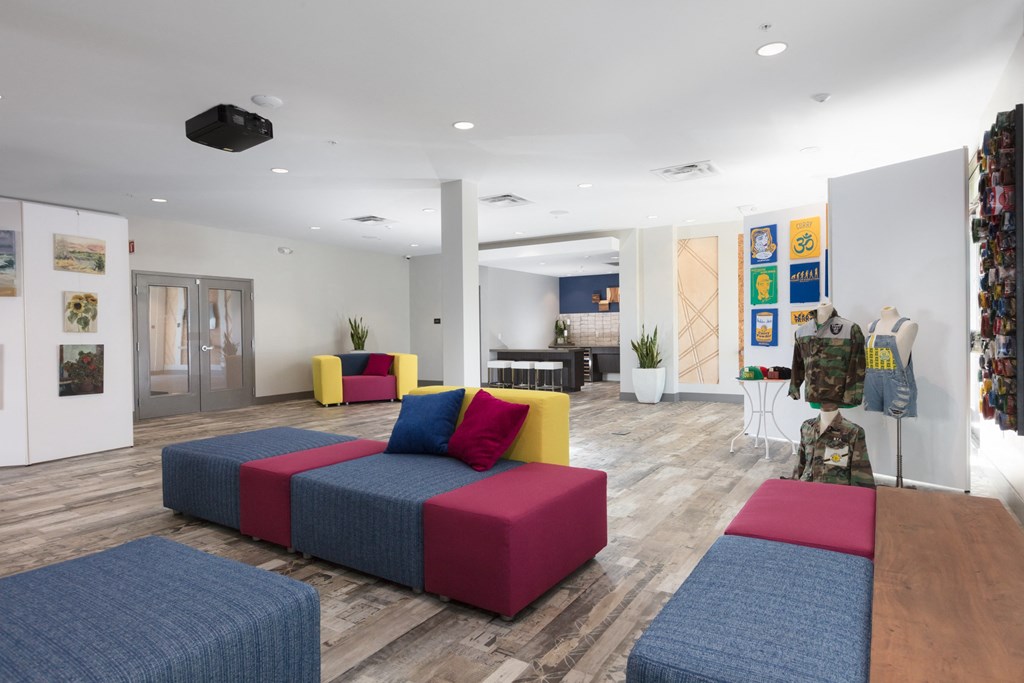 a room with couches and chairs