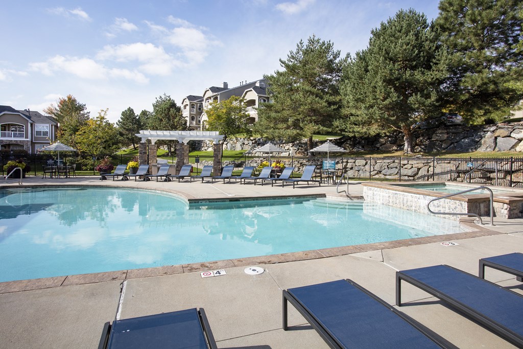 Pool Area with Seating at Stone Cliff Apartments